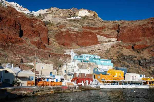 Panoramic view of Ammoudi,  the little harbor with fish taverns, surrounded by volcanic landscape