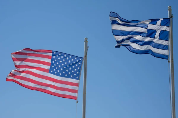 National Flags United States America Greece Waving Wind Blue Sky — Stock Photo, Image