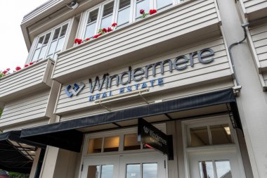 Tacoma, WA USA - circa August 2021: Low angle view of a Windermere real estate building in the old town area.