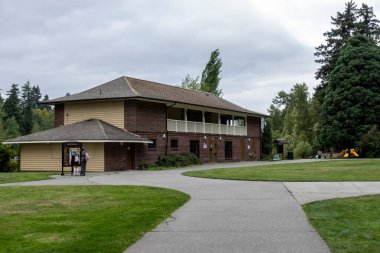 Tacoma, WA USA - circa August 2021: View of people spending time at Wapato Park in the downtown Tacoma area