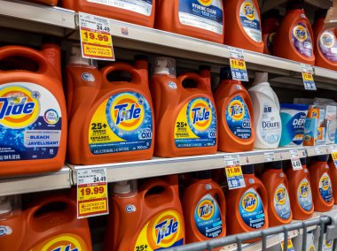 Kirkland, WA USA - circa September 2021: Angled view of a variety of laundry detergents for sale inside a Safeway grocery store.