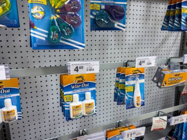 Mill Creek, WA USA - circa June 2022: Angled view of White Out products for sale inside a Staples store.
