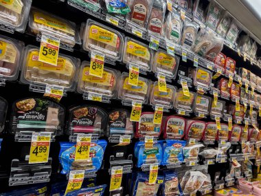 Woodinville, WA USA - circa May 2022: Angled view of a selection of sandwich meats for sale inside a Haggen grocery store.