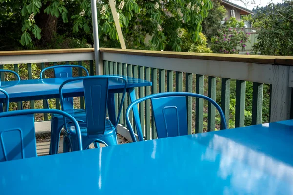 Colorful View Bright Blue Chairs Gathered Blue Table Outdoor Patio — Stock Photo, Image