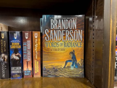 Bellevue, WA USA - circa July 2022: Close up, selective focus on Brandon Sanderson books for sale inside a Barnes and Noble book store.