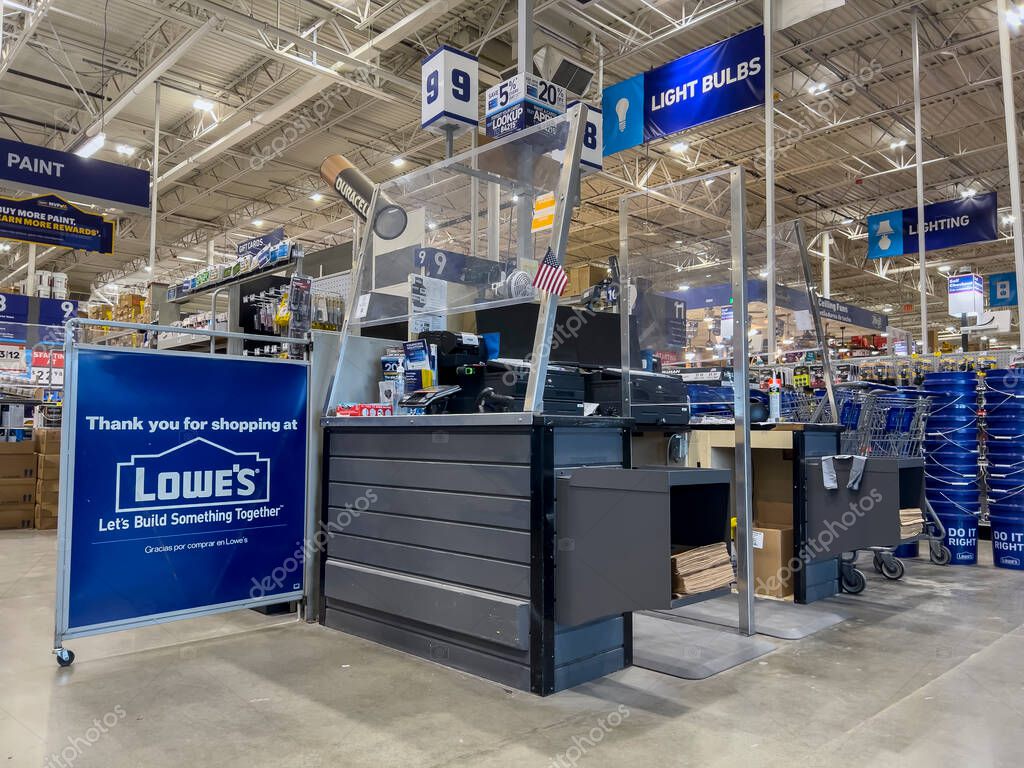 Everett, WA USA - circa July 2022: Angled view of a checkout counter inside a Lowes Home Improvement store.