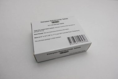 Seattle, WA USA - circa July 2022: Close up, selective focus on Eletriptan medication against a white background.