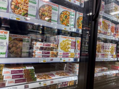 Everett, WA USA - circa June 2022: Angled selective focus on Lean Cuisine frozen meals for sale inside a Fred Meyer grocery store