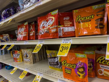 Everett, WA USA - circa August 2022: Angled, selective focus on bagged candy for sale inside an Albertsons grocery store.
