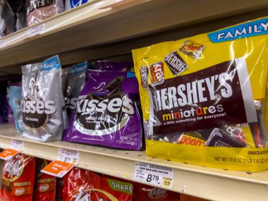 Everett, WA USA - circa August 2022: Angled, selective focus on bagged candy for sale inside an Albertsons grocery store.
