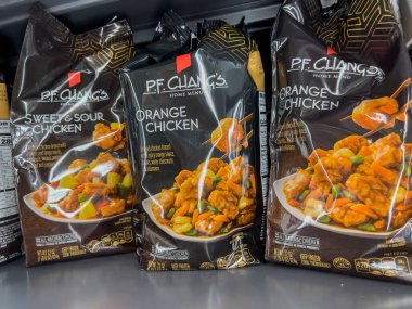 Everett, WA USA - circa August 2022: Angled, selective focus on P. F. Changs freezer meals for sale inside an Albertsons grocery store