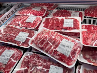 Bellevue, WA USA - circa July 2022: Close up, selective focus on sukiyaki beef cuts for sale inside an Uwajimaya grocery store
