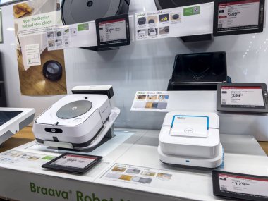 Seattle, WA USA - circa August 2022: Angled, selective focus on iRobot products for sale inside a Best Buy electronics store
