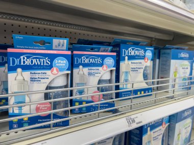 Seattle, WA USA - circa August 2022: Angled, selective focus on baby bottles for sale inside a Target retail store.