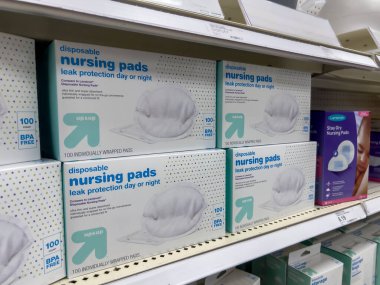 Seattle, WA USA - circa August 2022: Angled, selective focus on breastfeeding accessories for sale inside a Target retail store