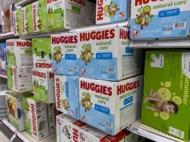 Seattle, WA USA - circa August 2022: Angled, selective focus on baby diapers and training pants for sale inside a Target retail store.