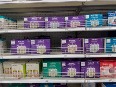 Seattle, WA USA - circa August 2022: Angled, selective focus on baby bottles for sale inside a Target retail store.