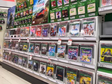 Seattle, WA USA - circa August 2022: Angled, selective focus on Xbox games for sale inside a Target store clipart