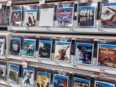 Seattle, WA USA - circa August 2022: Angled, selective focus on Playstation games for sale inside a Target store.