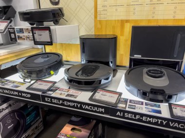 Seattle, WA USA - circa August 2022: Angled view of cleaning robots for sale inside a Best Buy store.