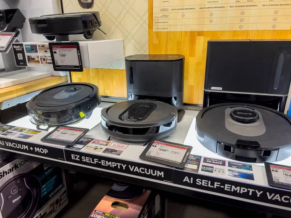Seattle, WA USA - circa August 2022: Angled view of cleaning robots for sale inside a Best Buy store.