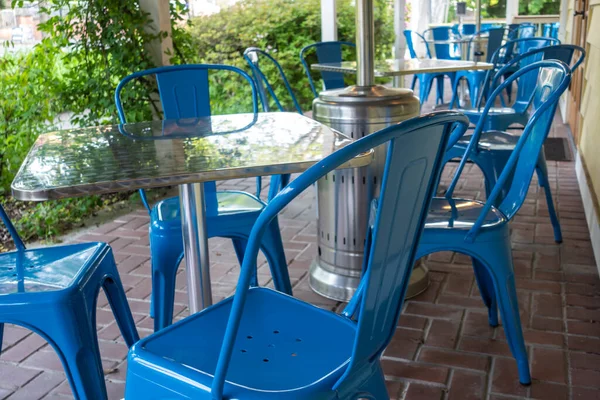 Colorful View Bright Blue Chairs Gathered Table Outdoor Patio Restaurant — Stock Fotó