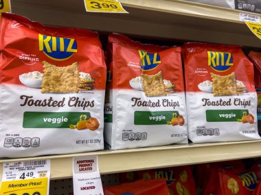 Seattle, WA USA - circa August 2022: Close up, selective focus on crackers for sale inside a Safeway grocery store.
