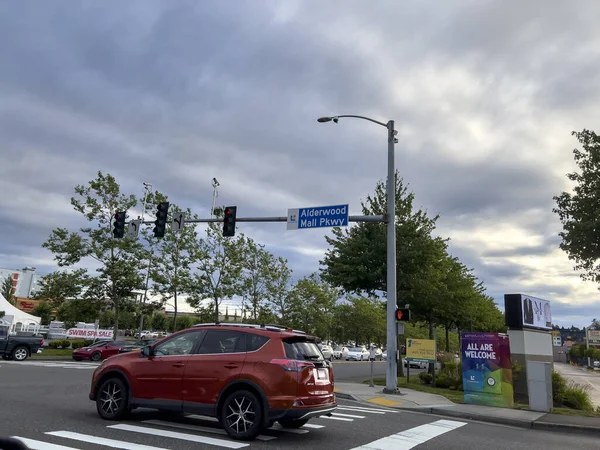 Lynnwood, WA USA - circa August 2022: View of the Alderwood Mall Parkway road sign in the central Lynnwood area by the mall.