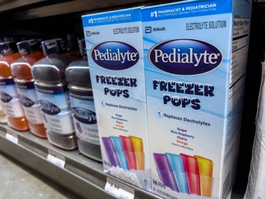 Mill Creek, WA USA - circa June 2022: Close up, selective focus on Pedialyte hydration products for sale inside a Town and Country Market.