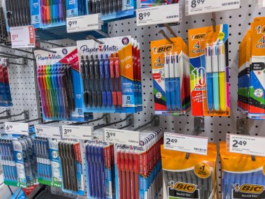 Seattle, WA USA - circa June 2022: Close up, selective focus on pens and pencils for sale inside a Staples store.