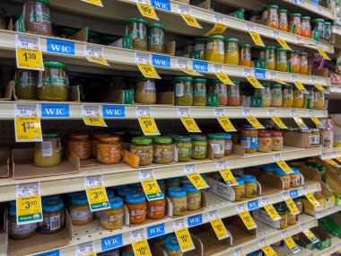 Seattle, WA USA - circa August 2022: Close up, selective focus on baby food for sale inside a Safeway grocery store.