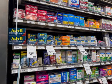 Mill Creek, WA USA - circa May 2022: Angled, selective focus on pain killers and allergy medicine.