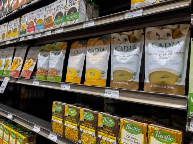 Mill Creek, WA USA - circa May 2022: Angled view of a collection of packaged soups for sale inside a Town and Country Market.