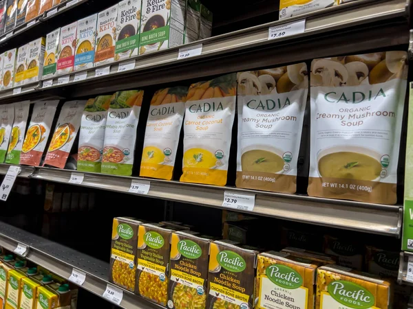 Mill Creek, WA USA - circa May 2022: Angled view of a collection of packaged soups for sale inside a Town and Country Market.