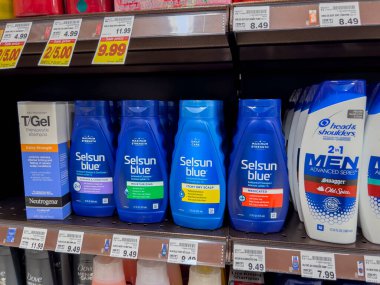 Mill Creek, WA USA - circa July 2022: View of a variety of dandruff shampoo for sale inside a QFC grocery store