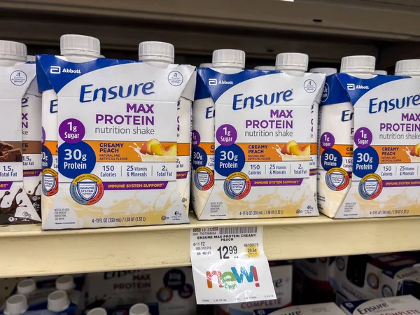 Seattle, WA USA - circa August 2022: Close up, selective focus on Ensure nutritional drinks for sale inside a Safeway grocery store.