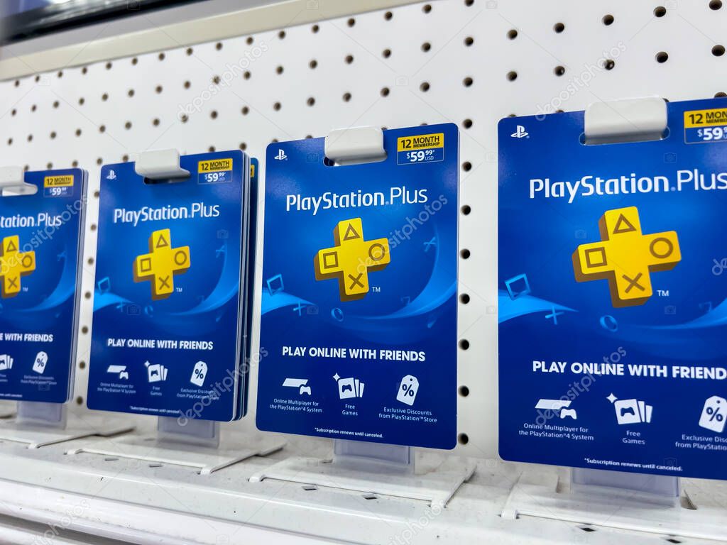 Lynnwood, WA USA - circa August 2022: Close up, selective focus on Playstation Plus subscription cards for sale inside a Target retail store.