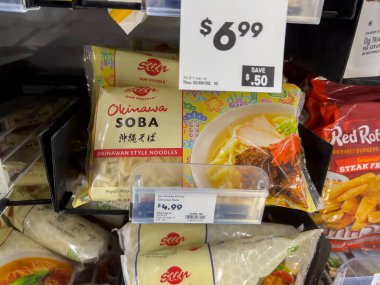 Mill Creek, WA USA - circa August 2022: Close up, selective focus on frozen soba noodles for sale inside a Town and Country Market.