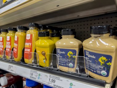 Lynnwood, WA USA - circa August 2022: Close up, selective focus on mustard for sale inside a Target retail store