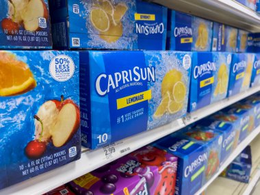 Lynnwood, WA USA - circa August 2022: Close up, selective focus on Capri Sun kids drinks for sale inside a Target retail store