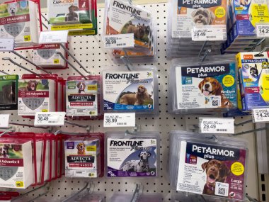 Lynnwood, WA USA - circa August 2022: Wide angle view of pet flea and tick treatments for sale inside a Target retail store.
