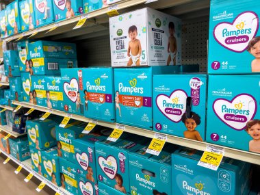 Seattle, WA USA - circa August 2022: Close up, selective focus on baby diapers for sale inside a Safeway grocery store.