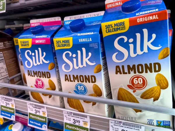 Seattle, WA USA - circa August 2022: Close up, selective focus on milk alternatives for sale inside a Safeway grocery store.