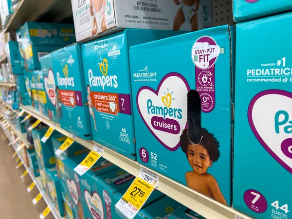 Seattle, WA USA - circa August 2022: Close up, selective focus on baby diapers for sale inside a Safeway grocery store.