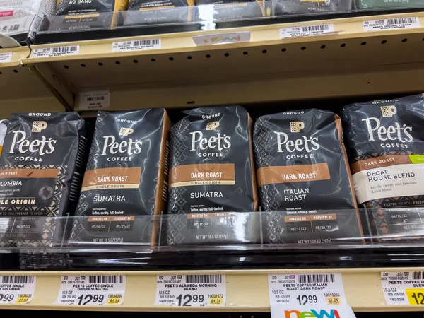 Seattle, WA USA - circa August 2022: Close up, selective focus on bagged coffee for sale inside a Safeway grocery store.