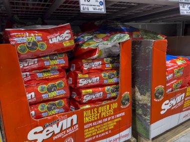 Seattle, WA USA - circa July 2022: Selective, angled focus on insect and pest killers for sale inside a Lowes Home Improvement store.