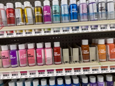 Lynnwood, WA USA - circa August 2022: Wide view of a variety of acrylic paints for sale inside a Joann Fabrics store.