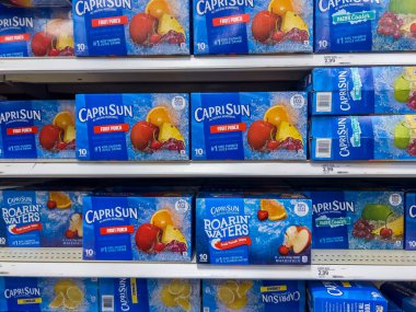 Lynnwood, WA USA - circa August 2022: Close up, selective focus on Capri Sun kids drinks for sale inside a Target retail store