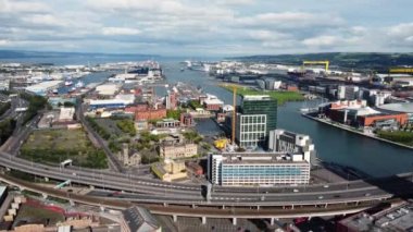 Aerial video of traffic driving through Belfast City Cityscape Northern Ireland 
