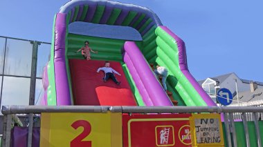 The big wheel Ferris wheel at the fun rides at Currys Barrys Amusements Portrush Northern Ireland 08-08-22